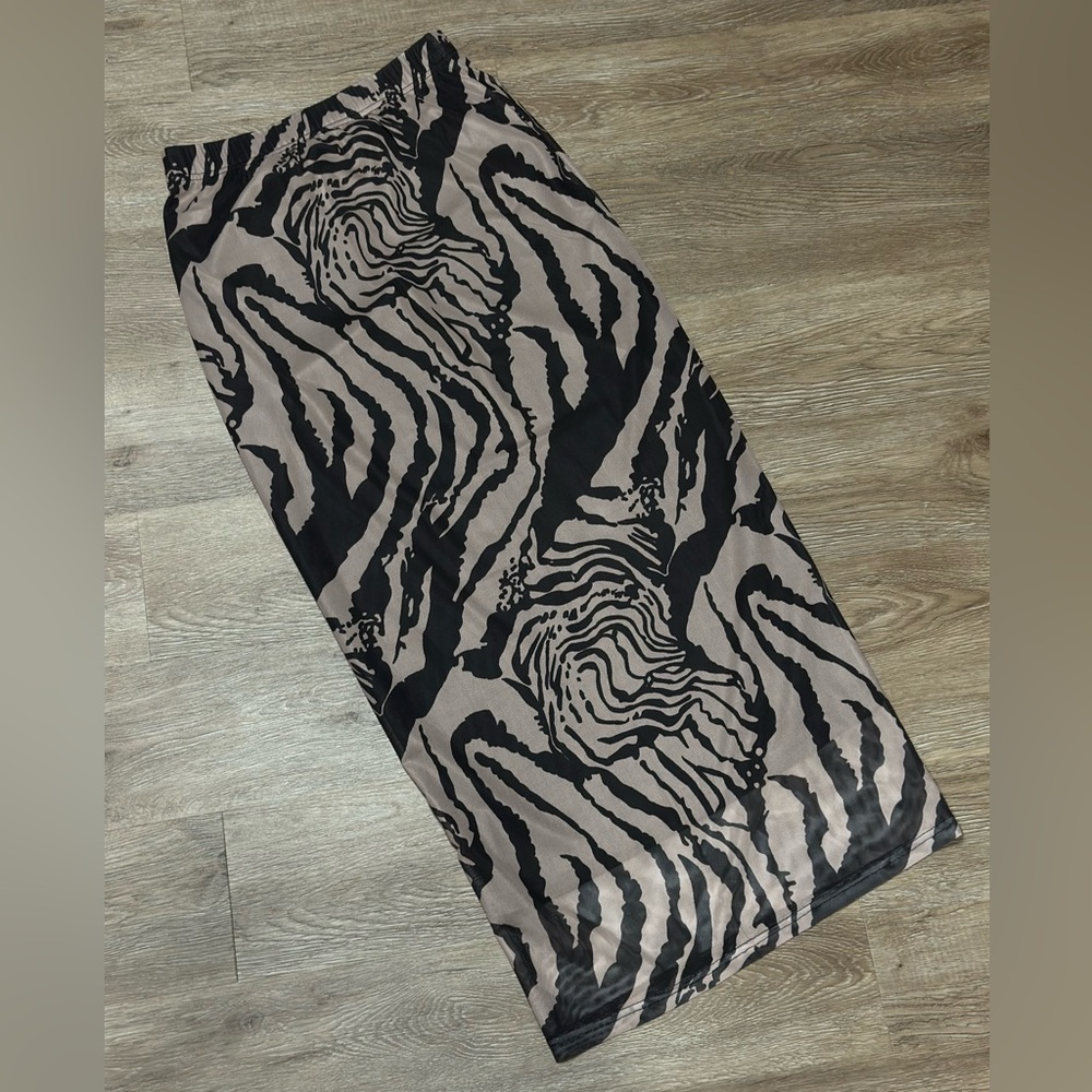 Brand new, never worn, animal print midi skirt